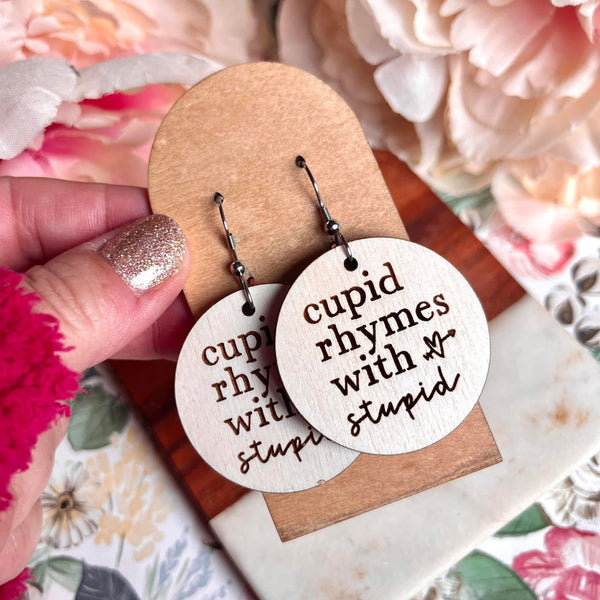 1.5" "Cupid Rhymes with Stupid" Ivory Wood Engraved Earrings