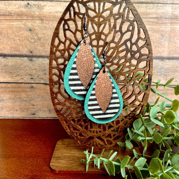 Copper, Striped, and Aqua Teardrop Earrings on Wood